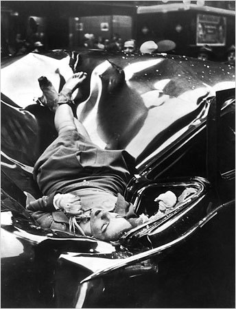 meepmeepmeep: (via hellsoap) On May 1, 1947, Evelyn McHale leapt to her death from the observation deck of the Empire State Building. Photographer Robert Wiles took a photo of McHale a few minutes after her death.  The photo ran a couple of weeks later in Life magazine accompanied by the following caption:  On May Day, just after leaving her fiancé, 23-year-old Evelyn McHale wrote a note. ‘He is much better off without me … I wouldn’t make a good wife for anybody,’ … Then she crossed it out. She went to the observation platform of the Empire State Building. Through the mist she gazed at the street, 86 floors below. Then she jumped. In her desperate determination she leaped clear of the setbacks and hit a United Nations limousine parked at the curb. Across the street photography student Robert Wiles heard an explosive crash. Just four minutes after Evelyn McHale’s death Wiles got this picture of death’s violence and its composure.